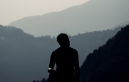 a man standing on a mountain