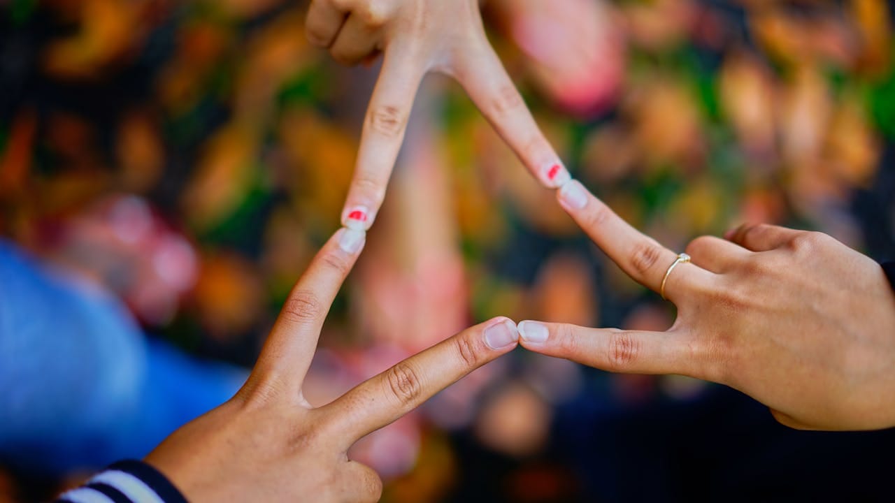 Photography of People Connecting Their Fingers to Link Between Addiction and Connection for Recovery