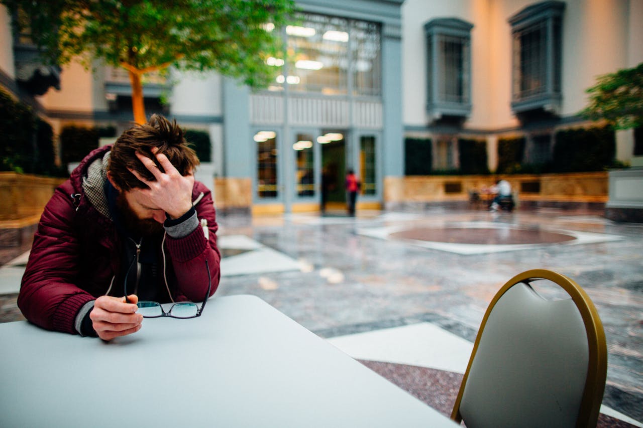 Woman practicing mindfulness meditation outdoors to overcome codependency and build self-worth