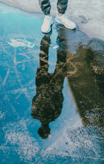 reflection of a man in water